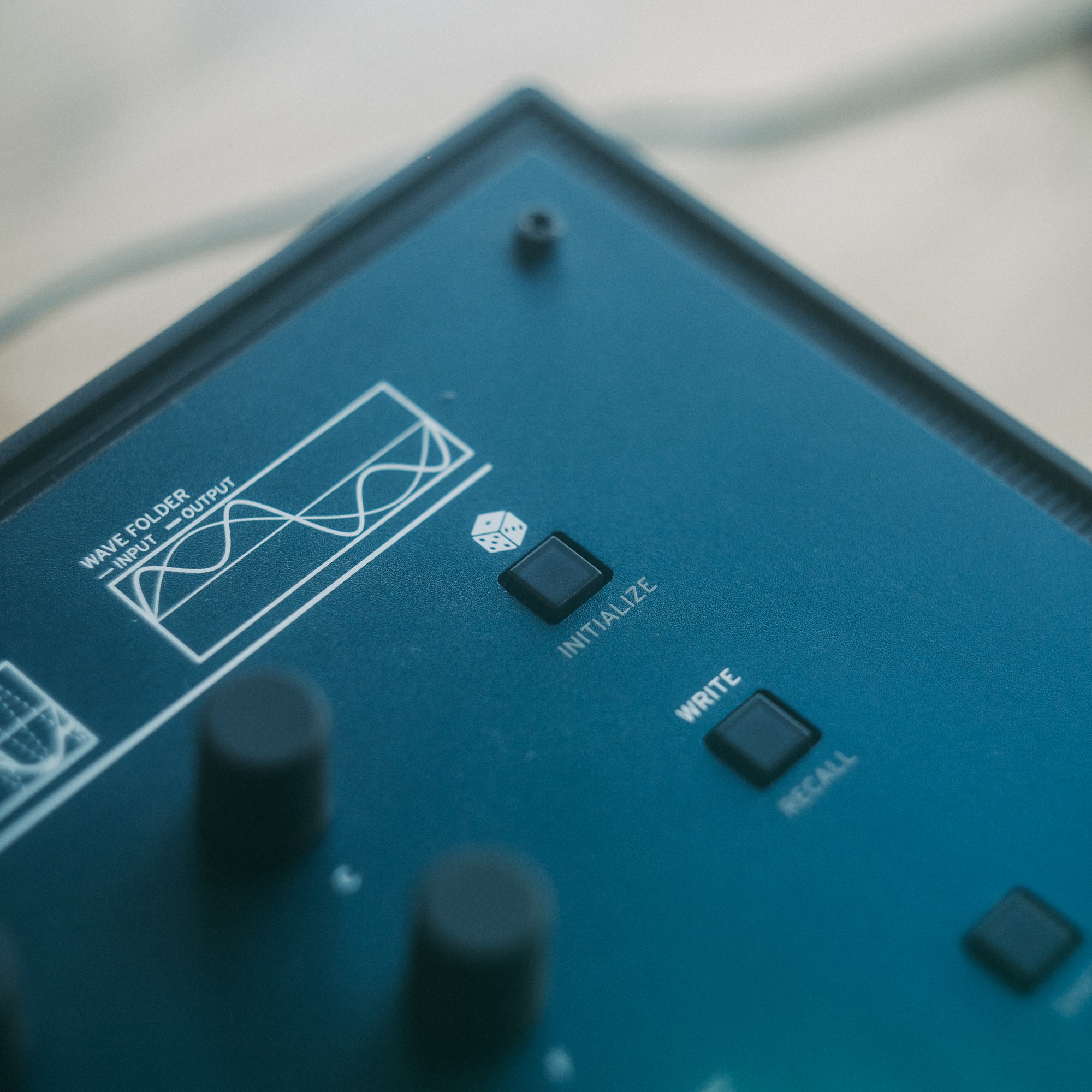 The RANDOMISE button on the Korg Opsix